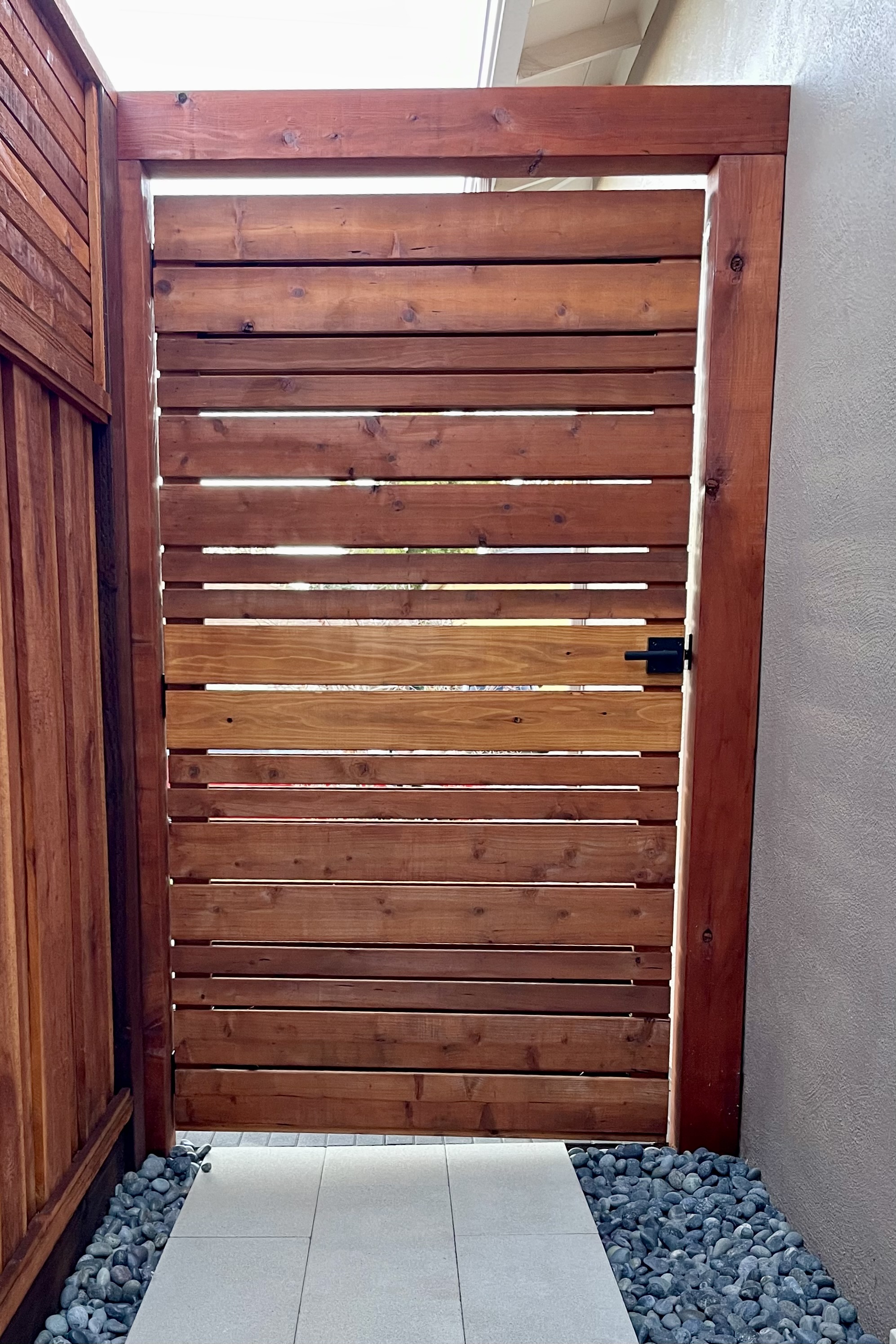 High-quality craftsmanship by West Gold Construction - custom wooden gate installation